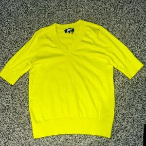 NWOT. Woman’s DKNY shirt sleeve v neck yellow sweater. Size L.